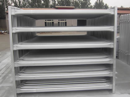 Several horse corral panels with oval bars.