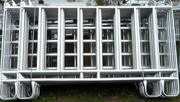 Several vertical rails galvanized horse panel feeding racks